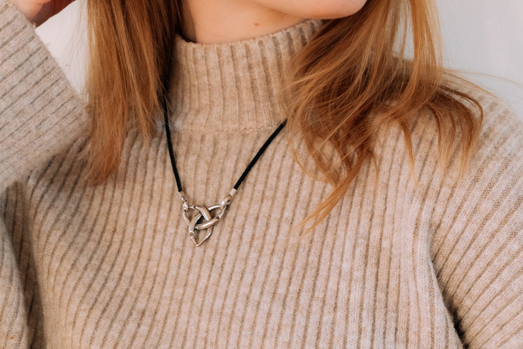 Model wearing Black Asian Cord from X Jewellery with a pendant attached to it.